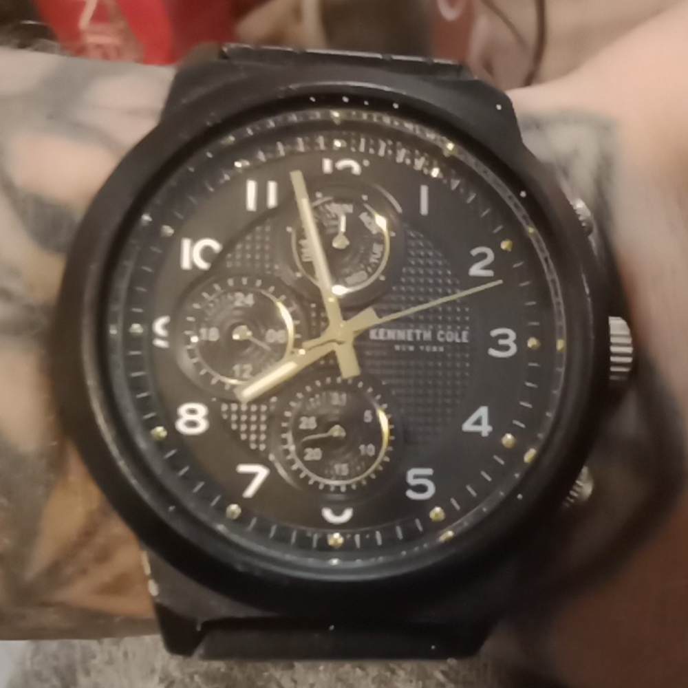 Kenneth Cole black watch. Very stylish I have two.